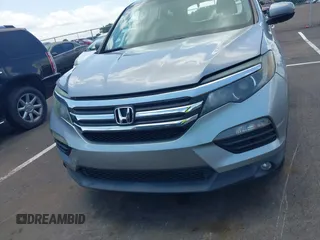 2018 Honda Pilot EX-L with VIN 5FNYF5H56JB003955, listed as a IAAI auction lot 42732433 with 116,613 mi miles and . Bid and sale history available at DreamBid. Image 12.