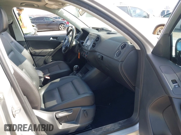 2013 Volkswagen Tiguan SE with VIN WVGAV7AX4DW545658, listed as a IAAI auction lot 41523168 with 188,729 mi miles and . Bid and sale history available at DreamBid. Image 5.