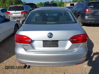 2014 Volkswagen Jetta Sedan S with VIN 3VW2K7AJ4EM208158, listed as a IAAI auction lot 42037477 with 156,483 mi miles. Bid and sale history available at carsss.com. Image 16.