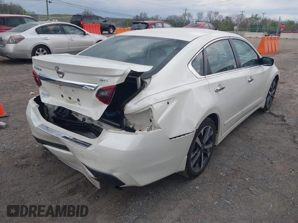 2017 Nissan Altima SR with VIN 1N4AL3APXHC152604, listed as a IAAI auction lot 41978787 with 104,268 mi miles and . Bid and sale history available at DreamBid. Image 4.