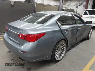 2015 Infiniti Q50 Premium z VIN JN1BV7AP6FM337369, wystawiony jako IAAI lot #41788419 z przebiegiem 106 977 mil mil oraz . Historia ofert i sprzedaży dostępna na DreamBid. Obrazek 4.