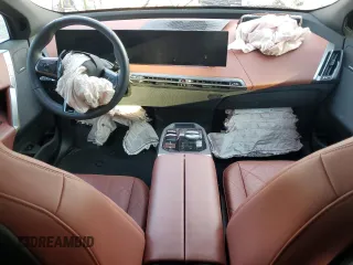 2025 BMW iX xDrive50 with VIN WB523CF0XSCS62033, listed as a Copart auction lot 42503325 with 7,294 mi miles and Salvage Title. Bid and sale history available at carsss.com. Image 8.