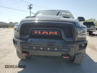 2016 Ram 1500 Rebel z VIN 1C6RR7YT1GS350439, wystawiony jako Copart lot #52300885 z przebiegiem 196 557 mil mil oraz Szkody całkowita. Historia ofert i sprzedaży dostępna na DreamBid. Obrazek 5.