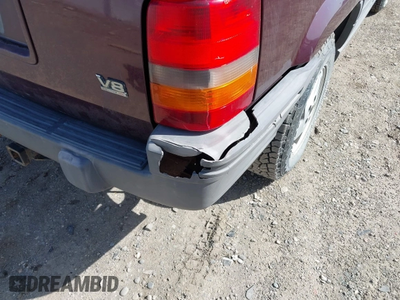 1994 Jeep Grand Cherokee Laredo with VIN 1J4GZ58Y2RC112641, listed as a IAAI auction lot 42212705 with 160,762 mi miles and . Bid and sale history available at DreamBid. Image 6.