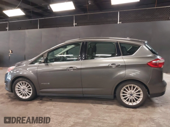 2013 Ford C-Max SEL z VIN 1FADP5BU9DL531704, wystawiony jako IAAI lot #42228841 z przebiegiem 91 808 mil mil oraz . Historia ofert i sprzedaży dostępna na DreamBid. Obrazek 14.