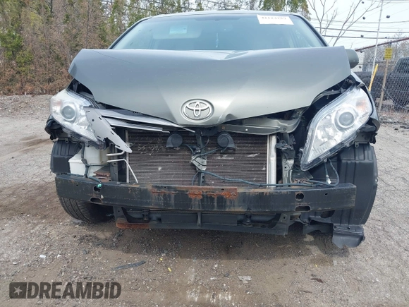 2012 Toyota Sienna XLE AAS with VIN 5TDYK3DC1CS199113, listed as a IAAI auction lot 42123757 with 211,723 mi miles and . Bid and sale history available at carsss.com. Image 6.