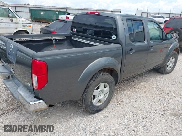 2005 Nissan Frontier LE with VIN 1N6AD07U45C451534, listed as a IAAI auction lot 42643704 with 233,237 mi miles and . Bid and sale history available at DreamBid. Image 4.