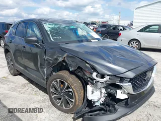 2022 Mazda CX-5 2.5 S Premium Plus Package with VIN JM3KFBEM6N0551143, listed as a IAAI auction lot 40524914 with 25,424 mi miles. Bid and sale history available at carsss.com. Image 1.