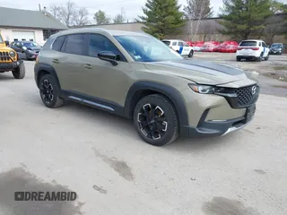 2023 Mazda CX-50 Meridian Edition z VIN 7MMVABXY3PN130331, wystawiony jako IAAI lot #41793745 z przebiegiem 32 162 mil mil oraz . Historia ofert i sprzedaży dostępna na DreamBid. Obrazek 1.