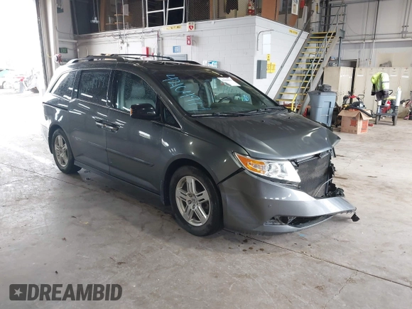 2011 Honda Odyssey Touring с VIN 5FNRL5H90BB025855, выставлен на аукционе IAAI как лот 42104979 с пробегом 165 010 миль миль и . История ставок и продаж доступна на DreamBid. Изображение 1.