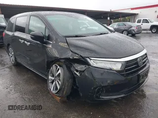 2022 Honda Odyssey Touring with VIN 5FNRL6H80NB047243, listed as a IAAI auction lot 41804719 with 107,627 mi miles and . Bid and sale history available at DreamBid. Image 1.
