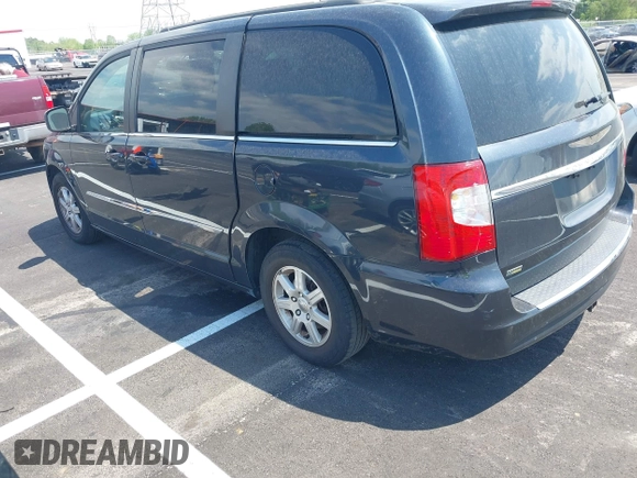 2013 Chrysler Town & Country Touring with VIN 2C4RC1BG8DR594671, listed as a IAAI auction lot 42039026 with 208,909 mi miles. Bid and sale history available at carsss.com. Image 3.