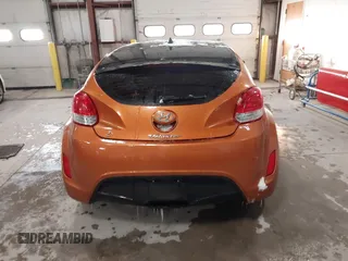 2012 Hyundai Veloster w/Gray Int z VIN KMHTC6AD6CU076954, wystawiony jako IAAI lot #41006441 z przebiegiem 73 767 mil mil oraz . Historia ofert i sprzedaży dostępna na DreamBid. Obrazek 16.