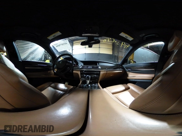 2014 BMW 7 Series ALPINA B7 xDrive with VIN WBAYF8C53ED141858, listed as a IAAI auction lot 40987098 with 128,404 mi miles and . Bid and sale history available at DreamBid. Image 18.