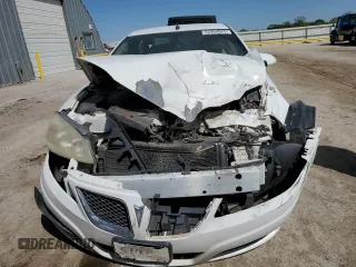 2010 Pontiac G6 1SB z VIN 1G2ZA5E00A4118557, wystawiony jako Copart lot #53303025 z przebiegiem Nie podano mil oraz Szkody całkowita. Historia ofert i sprzedaży dostępna na DreamBid. Obrazek 5.