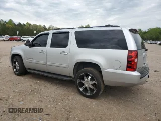 2014 Chevrolet Suburban LT z VIN 1GNSCJE00ER157634, wystawiony jako Copart lot #53271405 z przebiegiem 244 830 mil mil oraz Czysty tytuł • Clean title. Historia ofert i sprzedaży dostępna na DreamBid. Obrazek 2.