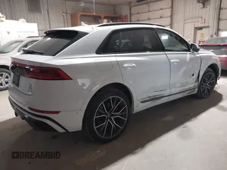 2021 Audi Q8 Premium Plus z VIN WA1EVAF11MD013975, wystawiony jako IAAI lot #41380207 z przebiegiem 77 979 mil mil oraz . Historia ofert i sprzedaży dostępna na DreamBid. Obrazek 4.