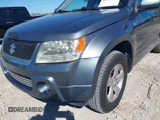 2006 Suzuki Grand Vitara Premium z VIN JS3TD943064100693, wystawiony jako IAAI lot #41772479 z przebiegiem 135 901 mil mil oraz . Historia ofert i sprzedaży dostępna na DreamBid. Obrazek 16.
