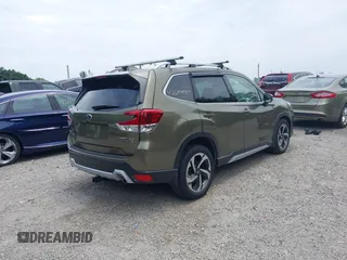 2023 Subaru Forester Touring with VIN JF2SKARC6PH400678, listed as a IAAI auction lot 42694547 with 14,484 mi miles and . Bid and sale history available at DreamBid. Image 4.