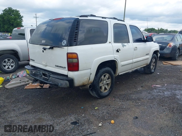 2002 Chevrolet Tahoe LS with VIN 1GNEK13Z22R143490, listed as a IAAI auction lot 42609711 with 323,388 mi miles and . Bid and sale history available at DreamBid. Image 4.