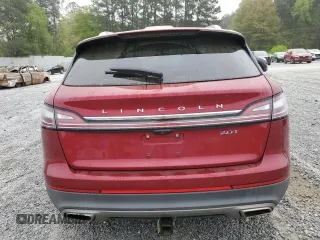 2019 Lincoln Nautilus Reserve z VIN 2LMPJ6L9XKBL57034, wystawiony jako Copart lot #51652415 z przebiegiem 51 302 mil mil oraz Szkoda całkowita • Salvage title. Historia ofert i sprzedaży dostępna na DreamBid. Obrazek 6.