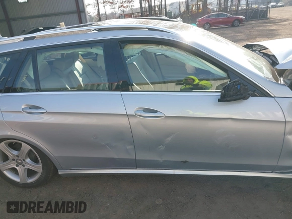 2016 Mercedes-Benz E-Class E 350 Luxury with VIN WDDHH8JB9GB233941, listed as a IAAI auction lot 41184353 with 79,303 mi miles. Bid and sale history available at carsss.com. Image 13.