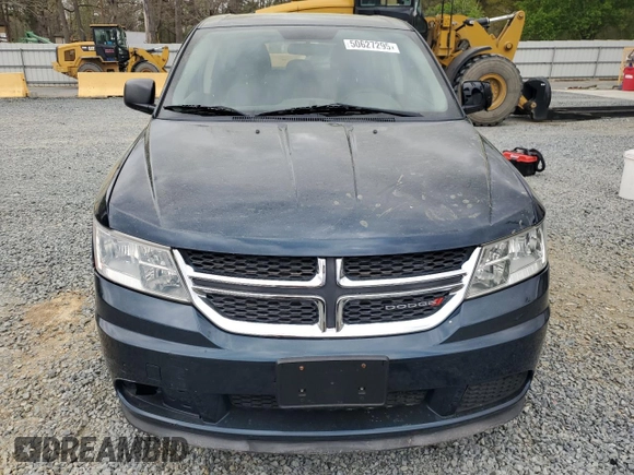 2013 Dodge Journey American Value with VIN 3C4PDCAB6DT577273, listed as a Copart auction lot 50627295 with 139,775 mi miles and Salvage title. Bid and sale history available at DreamBid. Image 5.