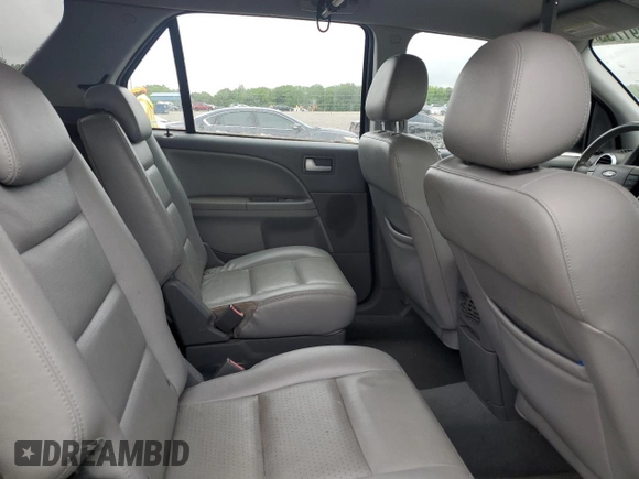2006 Ford Freestyle SEL z VIN 1FMZK02106GA24446, wystawiony jako Copart lot #56291755 z przebiegiem 154 067 mil mil oraz Szkoda całkowita • Salvage title. Historia ofert i sprzedaży dostępna na DreamBid. Obrazek 11.