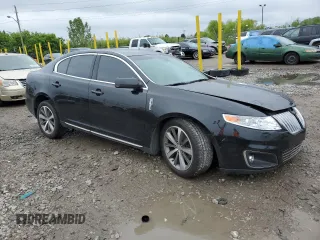2010 Lincoln MKS z VIN 1LNHL9DR5AG601996, wystawiony jako Copart lot #57711335 z przebiegiem Nie podano mil oraz Szkoda całkowita • Salvage title. Historia ofert i sprzedaży dostępna na DreamBid. Obrazek 4.