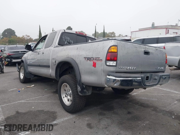 2003 Toyota Tundra SR5 with VIN 5TBBT44113S350273, listed as a IAAI auction lot 40482066 with 219,831 mi miles and . Bid and sale history available at DreamBid. Image 3.