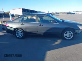 2005 Honda Accord EX with VIN 1HGCM56715A022210, listed as a IAAI auction lot 41165319 with 232,830 mi miles and . Bid and sale history available at DreamBid. Image 14.