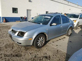 2002 Volkswagen Jetta GLS с VIN 3VWSP69M92M075662, выставлен на аукционе Copart как лот 43658175 с пробегом Не указан миль и Списание • Salvage title. История ставок и продаж доступна на DreamBid. Изображение 1.