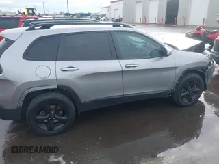 2018 Jeep Cherokee Latitude with VIN 1C4PJMCX4JD548136, listed as a IAAI auction lot 41592821 with 165,022 mi miles and . Bid and sale history available at DreamBid. Image 13.