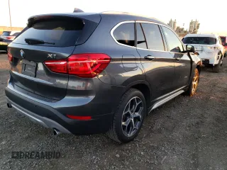 2017 BMW X1 xDrive28i with VIN WBXHT3C30H5F71865, listed as a Copart auction lot 67841122 with 75,471 mi miles. Bid and sale history available at carsss.com. Image 3.