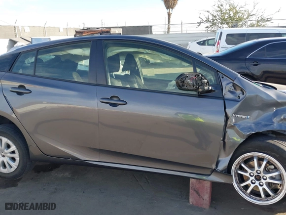 2020 Toyota Prius L Eco with VIN JTDKARFU8L3105988, listed as a IAAI auction lot 41688339 with 66,660 mi miles. Bid and sale history available at carsss.com. Image 13.