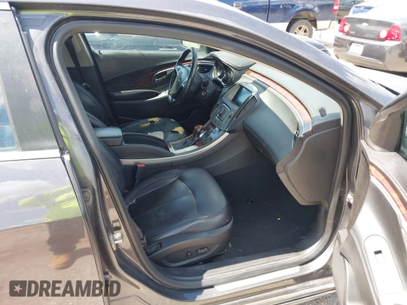 2013 Buick LaCrosse Leather z VIN 1G4GC5E37DF159523, wystawiony jako IAAI lot #42564794 z przebiegiem 236 083 mil mil oraz . Historia ofert i sprzedaży dostępna na DreamBid. Obrazek 5.