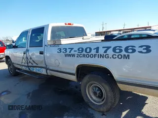 1999 GMC Sierra 3500 z VIN 1GTGC33R4XF094778, wystawiony jako IAAI lot #41229630 z przebiegiem 199 345 mil mil oraz . Historia ofert i sprzedaży dostępna na DreamBid. Obrazek 16.