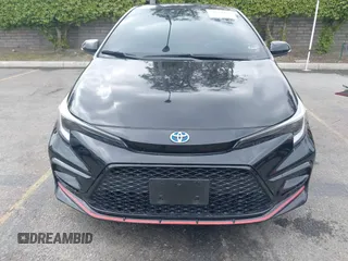 2023 Toyota Corolla Hybrid LE with VIN JTDBCMFE6P3016299, listed as a IAAI auction lot 41884437 with 24,955 mi miles. Bid and sale history available at carsss.com. Image 13.