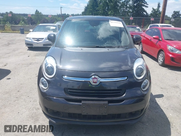 2014 FIAT 500L Easy with VIN ZFBCFABH0EZ028102, listed as a IAAI auction lot 42721149 with 115,137 mi miles and . Bid and sale history available at DreamBid. Image 6.