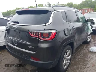 2018 Jeep Compass Latitude with VIN 3C4NJDBB5JT337129, listed as a IAAI auction lot 42330631 with 126,827 mi miles and . Bid and sale history available at DreamBid. Image 4.