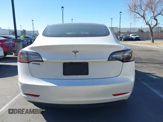 2023 Tesla Model 3 with VIN 5YJ3E1EA6PF411940, listed as a IAAI auction lot 41829537 with 32,877 mi miles and . Bid and sale history available at carsss.com. Image 15.