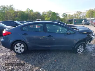 2016 Kia Forte LX z VIN KNAFK4A68G5477333, wystawiony jako IAAI lot #42196777 z przebiegiem 77 805 mil mil oraz . Historia ofert i sprzedaży dostępna na DreamBid. Obrazek 14.