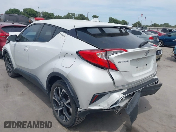 2022 Toyota C-HR XLE z VIN NMTKHMBX2NR144638, wystawiony jako IAAI lot #42063325 z przebiegiem 22 823 mil mil oraz . Historia ofert i sprzedaży dostępna na DreamBid. Obrazek 3.