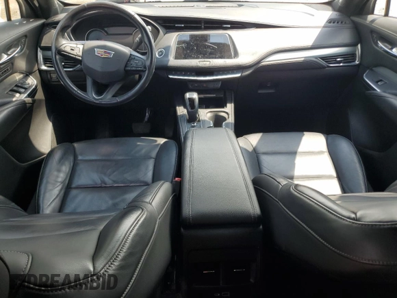 2019 Cadillac XT4 FWD Premium Luxury с VIN 1GYFZCR41KF127888, выставлен на аукционе Copart как лот 55027135 с пробегом 111 057 миль миль и Списание • Salvage title. История ставок и продаж доступна на DreamBid. Изображение 8.