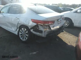 2017 Kia Optima EX with VIN 5XXGU4L32HG156941, listed as a IAAI auction lot 40299001 with 128,592 mi miles. Bid and sale history available at carsss.com. Image 6.