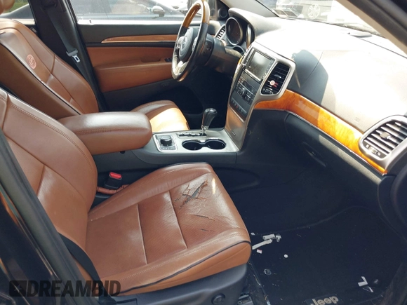 2011 Jeep Grand Cherokee Overland with VIN 1J4RR6GT3BC574037, listed as a IAAI auction lot 42411532 with 158,765 mi miles and . Bid and sale history available at DreamBid. Image 5.