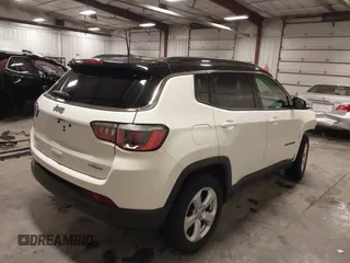 2019 Jeep Compass Latitude with VIN 3C4NJDBB0KT834607, listed as a IAAI auction lot 41932794 with 74,694 mi miles. Bid and sale history available at carsss.com. Image 4.