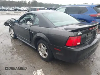 2004 Ford Mustang Standard z VIN 1FAFP40414F105171, wystawiony jako IAAI lot #41754232 z przebiegiem Nie podano mil oraz . Historia ofert i sprzedaży dostępna na DreamBid. Obrazek 3.