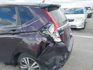 2015 Honda Fit EX-L with VIN 3HGGK5H89FM758572, listed as a IAAI auction lot 41784414 with 97,707 mi miles. Bid and sale history available at carsss.com. Image 6.