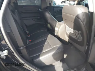 2015 Cadillac SRX with VIN 3GYFNAE38FS622913, listed as a IAAI auction lot 41590242 with 114,062 mi miles and . Bid and sale history available at DreamBid. Image 8.